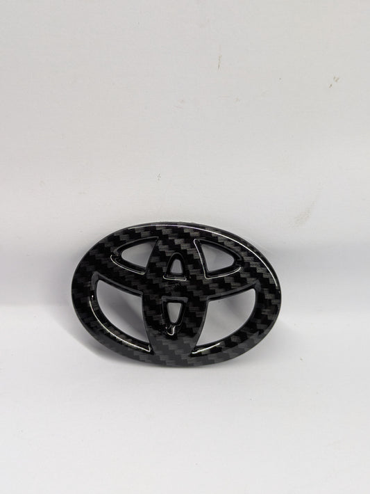 Toyota carbon steering logo